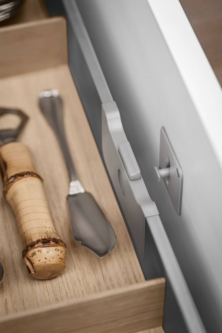 An interior drawer elegantly doubles storage space in SieMatic kitchen drawers and pull-outs